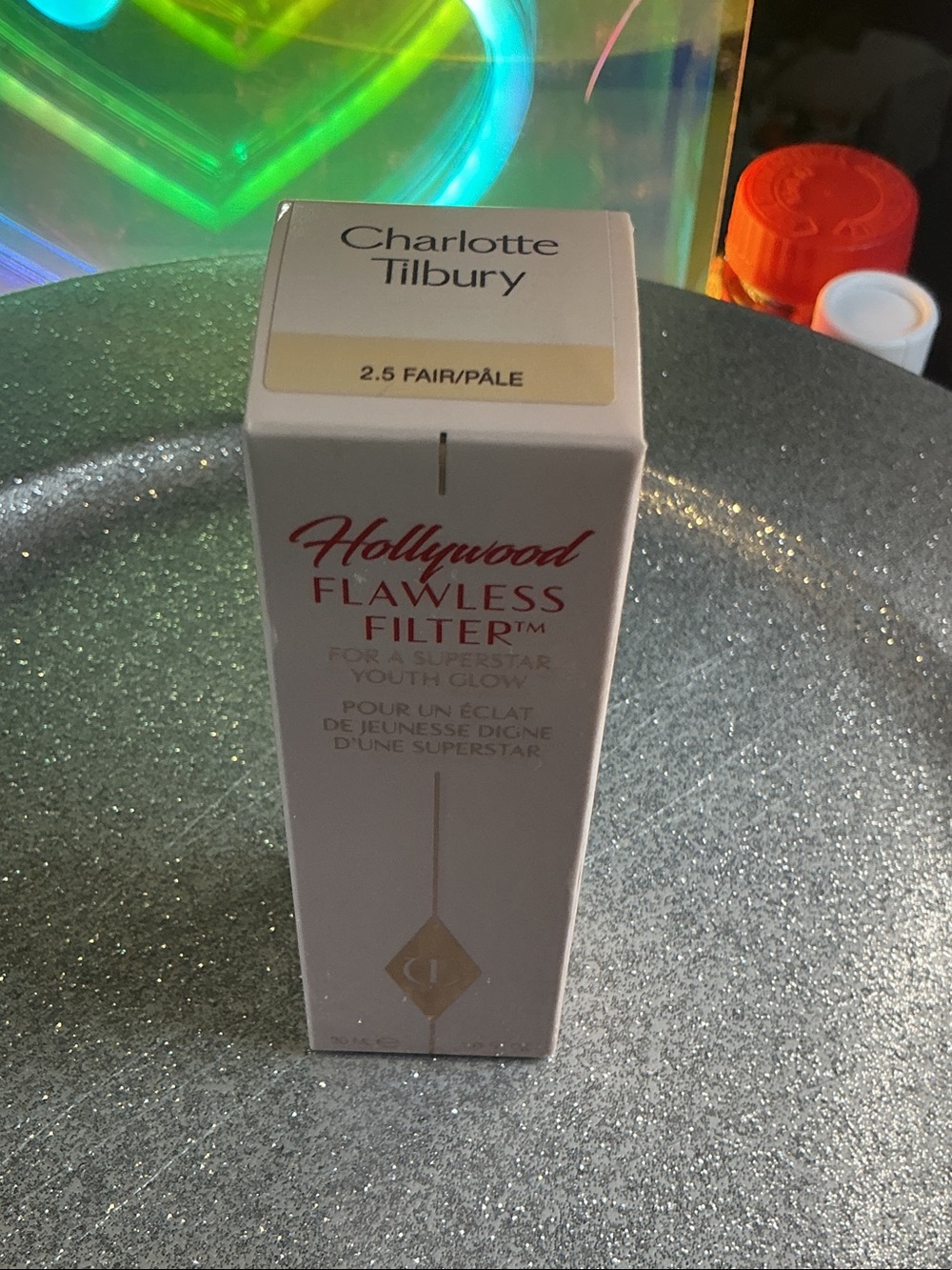 Product Box on Glitter Surface